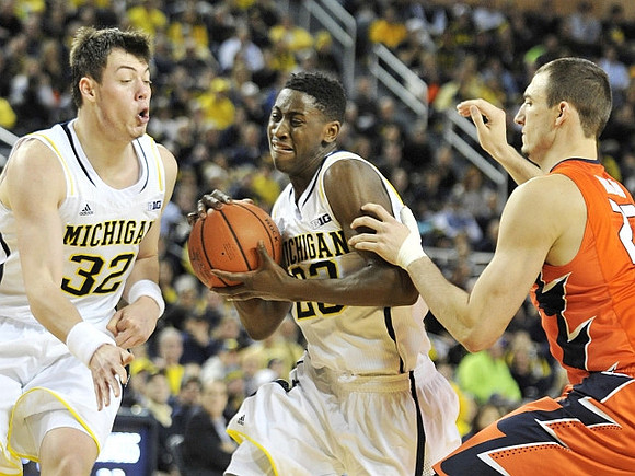 Ricky Doyle (32) and Caris LeVert (23)