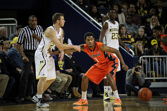 Spike Albrecht (2) and Caris LeVert (23)