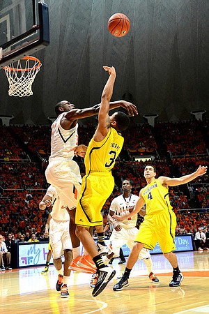 Trey Burke (3) and Mitch McGary (4)