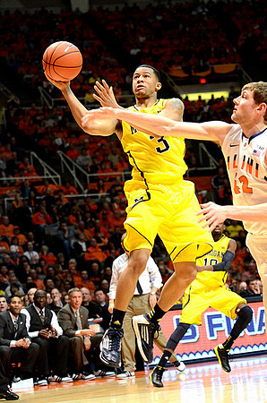Trey Burke (3) and Tim Hardaway Jr. (10)