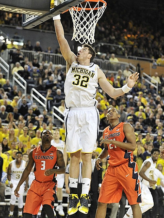 Ricky Doyle (32) and Derrick Walton Jr. (10)