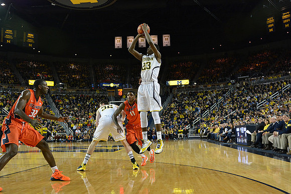 Ricky Doyle (32) and Caris LeVert (23)