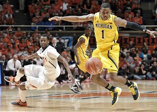Glenn Robinson III (1) and Caris LeVert (23)