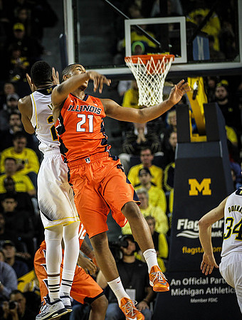 Zak Irvin (21) and Mark Donnal (34)
