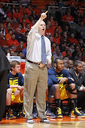 Spike Albrecht (2), John Beilein, Jon Horford (15), and LaVall Jordan