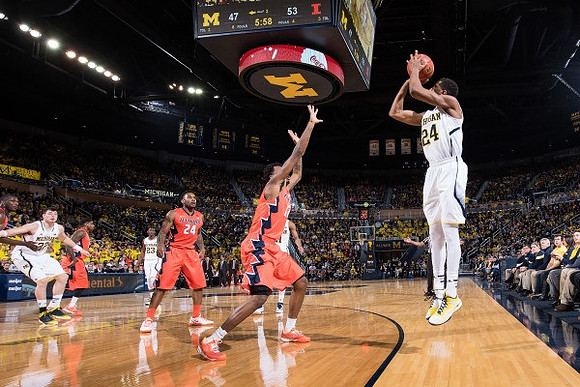 Ricky Doyle (32), Caris LeVert (23), and Aubrey Dawkins (24)