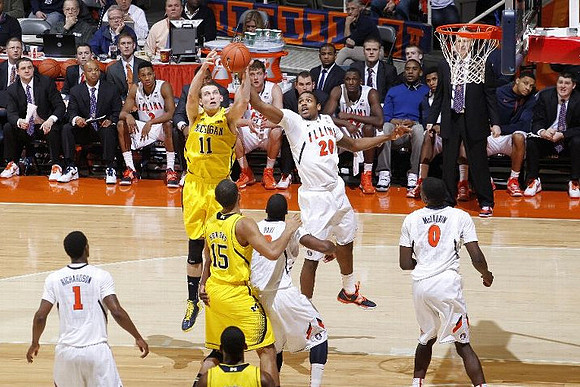 Nik Stauskas (11), Jon Horford (15), and Glenn Robinson III (1)