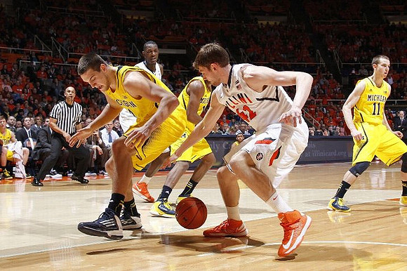 Mitch McGary (4), Glenn Robinson III (1), and Nik Stauskas (11)