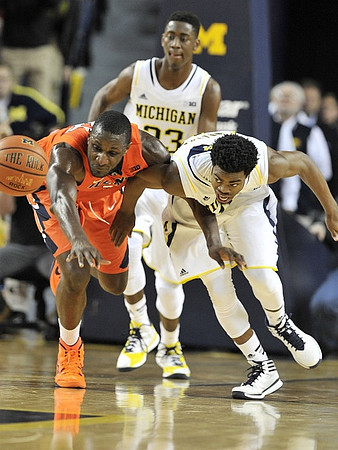 Caris LeVert (23) and Derrick Walton Jr. (10)