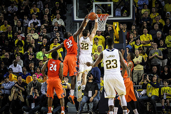 Ricky Doyle (32) and Caris LeVert (23)