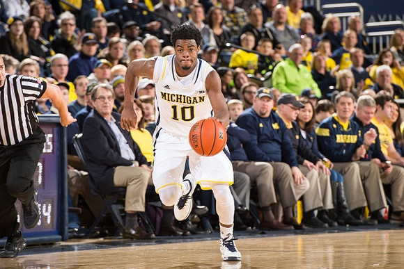 Derrick Walton Jr. (10) and Lloyd Carr