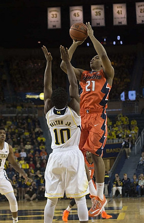 Kameron Chatman (3) and Derrick Walton Jr. (10)