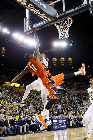 Zak Irvin (21) and Caris LeVert (23)