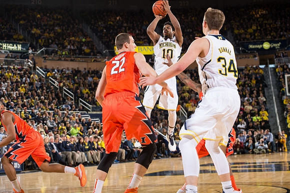 Derrick Walton Jr. (10) and Mark Donnal (34)