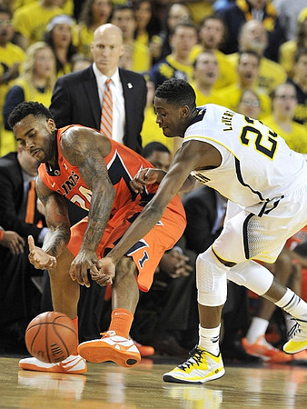Caris LeVert (23) and Illinois Head Head Coach John Groce