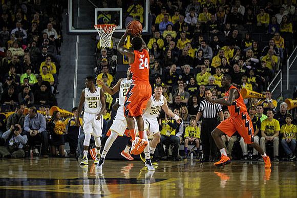 Caris LeVert (23), Zak Irvin (21), and Ricky Doyle (32)