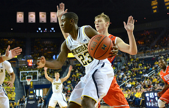 Spike Albrecht (2) and Caris LeVert (23)