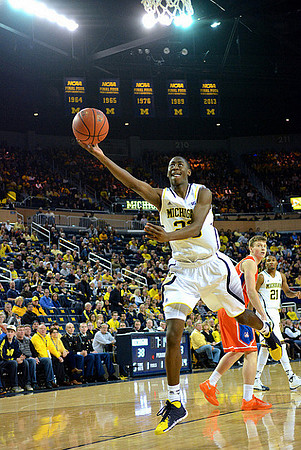Caris LeVert (23) and Zak Irvin (21)