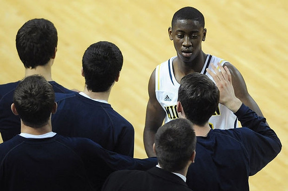 Caris LeVert (23) and Michigan Team