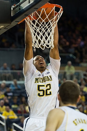 Jordan Morgan (52) and Nik Stauskas (11)