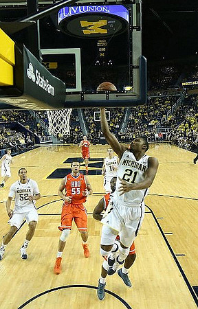 Spike Albrecht (2), Jordan Morgan (52), Nik Stauskas (11), and Zak Irvin (21)