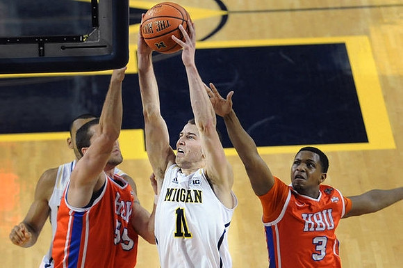Nik Stauskas (11) and Jon Horford (15)