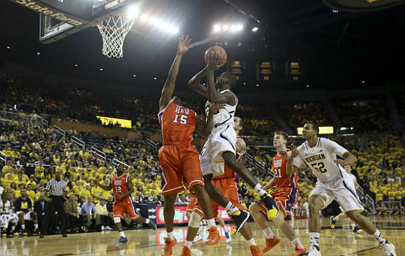 Caris LeVert (23) and Jordan Morgan (52)
