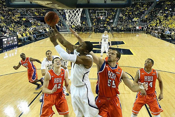 Jordan Morgan (52), Derrick Walton Jr. (10), Glenn Robinson III (1), and Nik Stauskas (11)