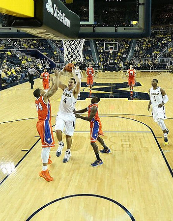 Mitch McGary (4), Nik Stauskas (11), and Glenn Robinson III (1)