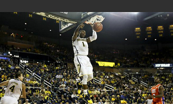 Mitch McGary (4) and Glenn Robinson III (1)