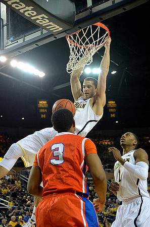 Nik Stauskas (11) and Glenn Robinson III (1)