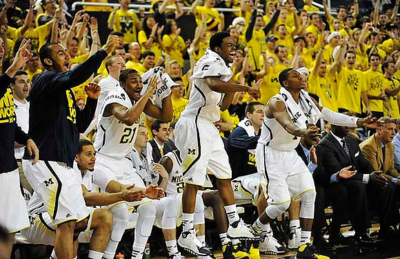 Jon Horford (15), Jordan Morgan (52), Zak Irvin (21), Nik Stauskas (11), Derrick Walton Jr. (10), Mitch McGary (4), Glenn Robinson III (1), Bacari Alexander, and Jeff Meyer