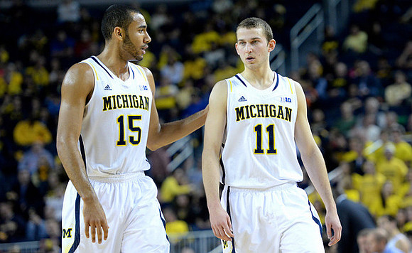 Jon Horford (15) and Nik Stauskas (11)