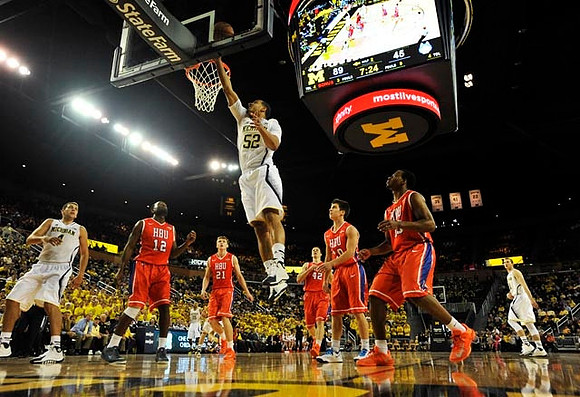 Mitch McGary (4), Jordan Morgan (52), and Nik Stauskas (11)