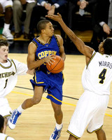 Stu Douglass (1) and Darius Morris (4)