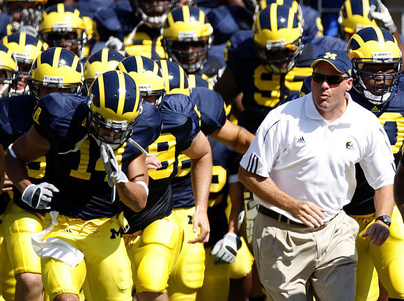 Morgan Trent and Rich Rodriguez