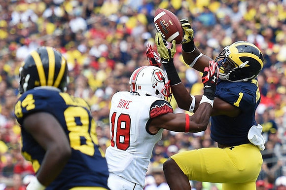 A.J. Williams (84) and Devin Funchess (1)