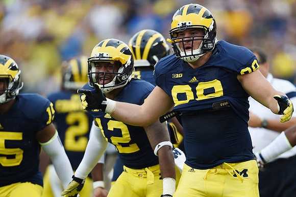 James Ross (15), Allen Gant (12), and Jake Butt (88)