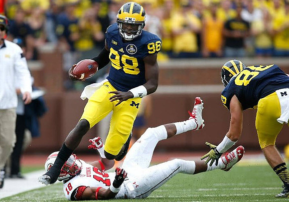 Devin Gardner (98) and Jake Butt (88)