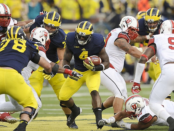 Erik Magnuson (78 and De'Veon Smith (4)