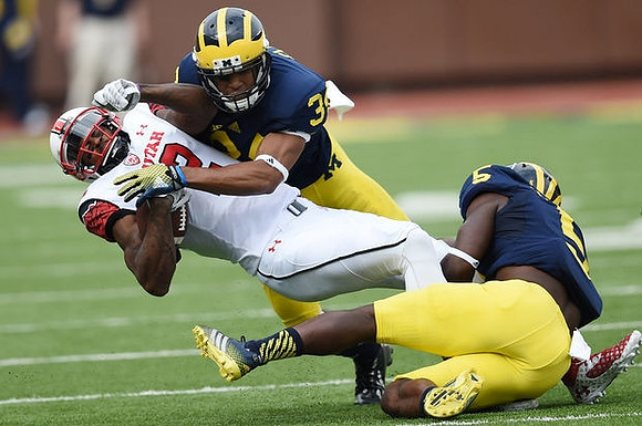 Jeremy Clark (34) and Jabrill Peppers (5)