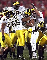 Alan Branch, Brandon Harrison, LaMarr Woodley, Shawn Crable, and Chris Graham