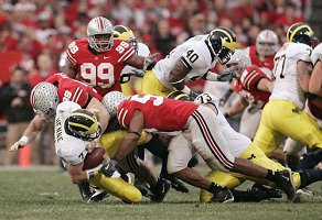 Chad Henne, Alex Mitchell, Obi Oluigbo, and Jake Long