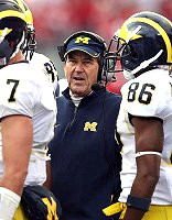 Lloyd Carr, Chad Henne, Tyler Ecker, and Mario Manningham