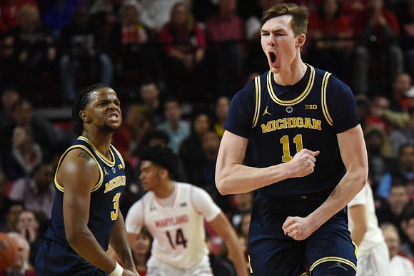Zavier Simpson (3) and Colin Castleton (11)