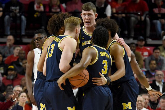 Isaiah Livers (4), Ignas Brazdeikis (13), Jon Teske (15), Zavier Simpson (3), and Jordan Poole (2)