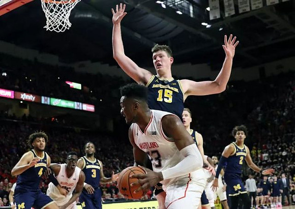 Isaiah Livers (4), Zavier Simpson (3), Jon Teske (15), Ignas Brazdeikis (13), and Jordan Poole (2)