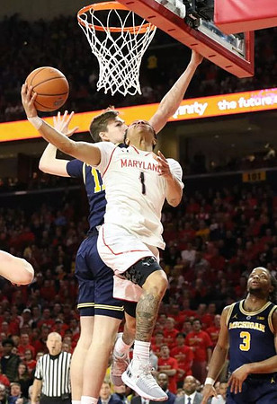 Colin Castleton (11) and Zavier Simpson (3)