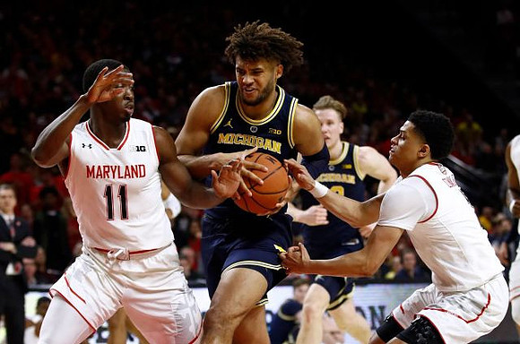 Isaiah Livers (4) and Ignas Brazdeikis (13)