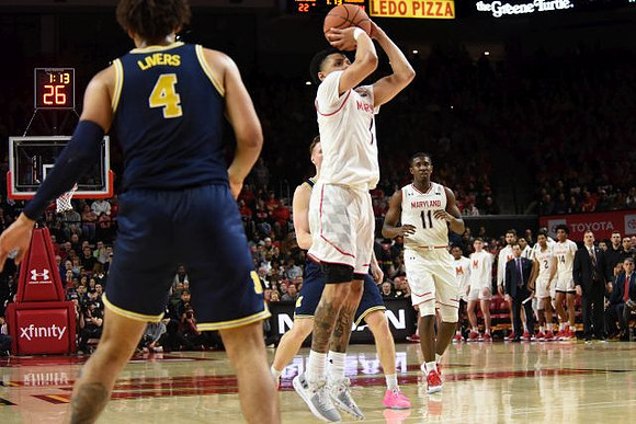Isaiah Livers (4) and Ignas Brazdeikis (13)